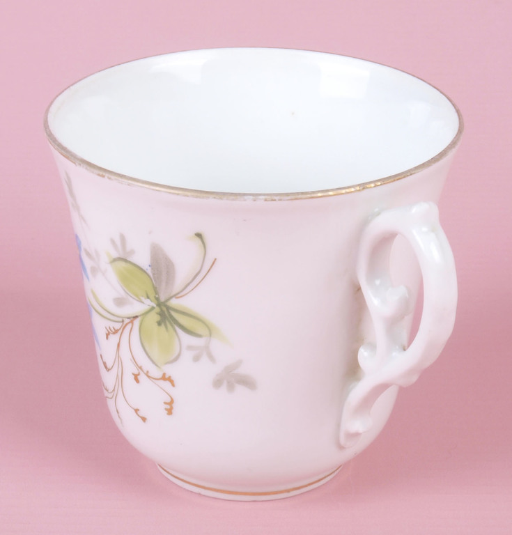 Porcelain cup with saucer