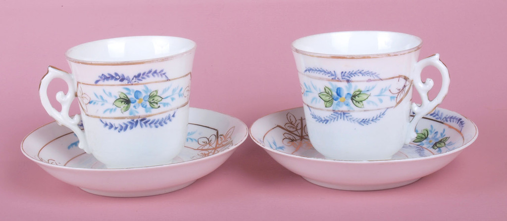 Porcelain cup with saucer, pair