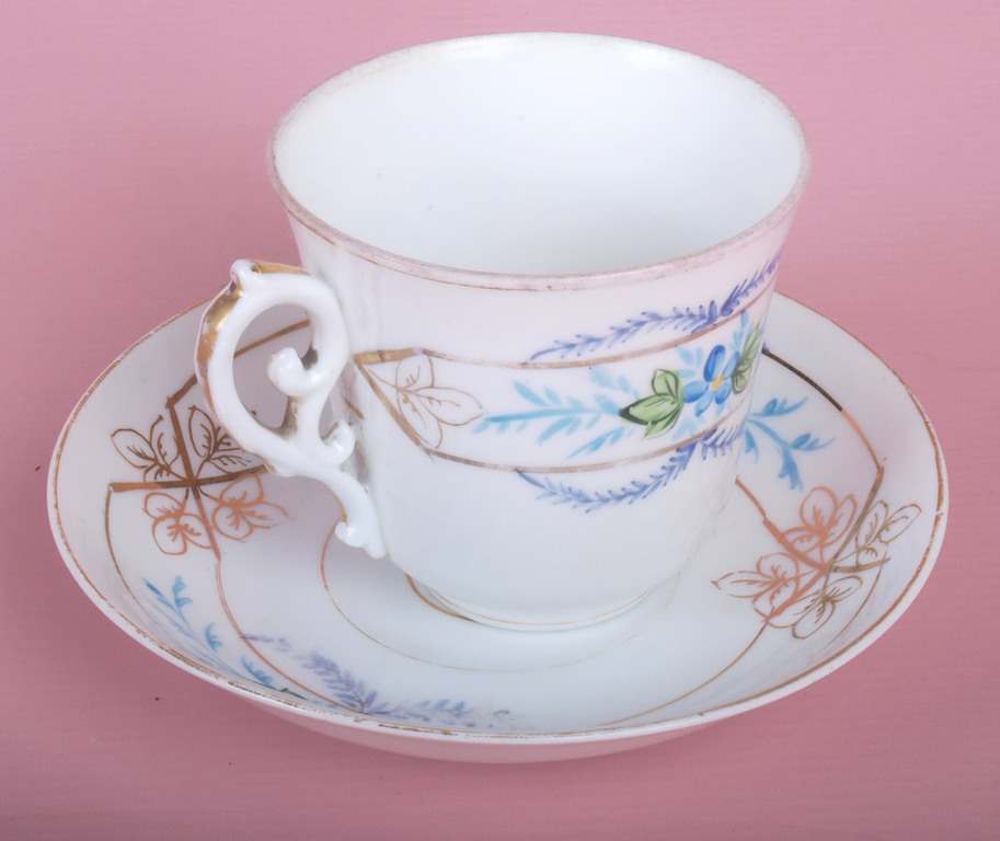 Porcelain cup with saucer, pair