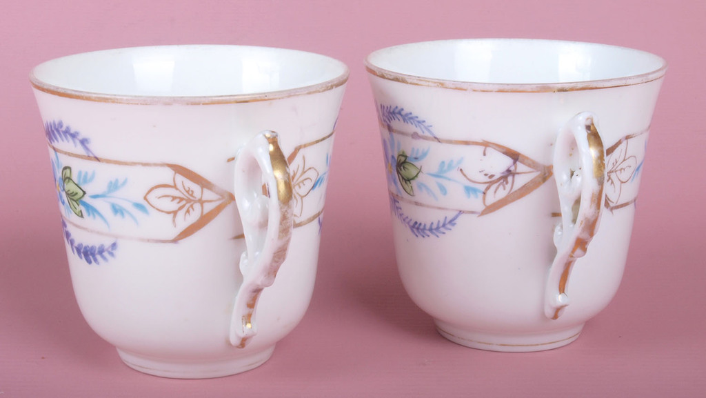Porcelain cup with saucer, pair
