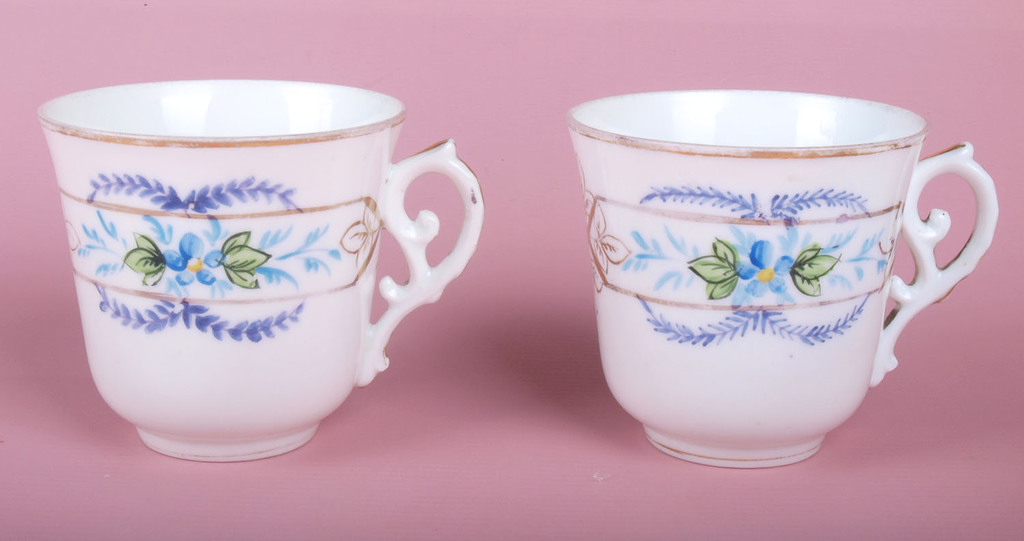 Porcelain cup with saucer, pair