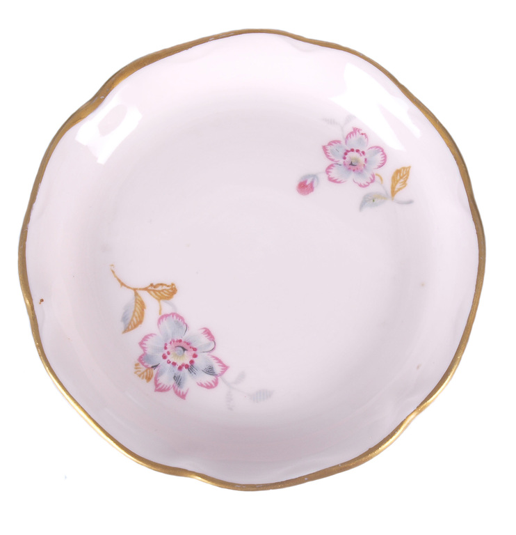 A small porcelain plate with flowers