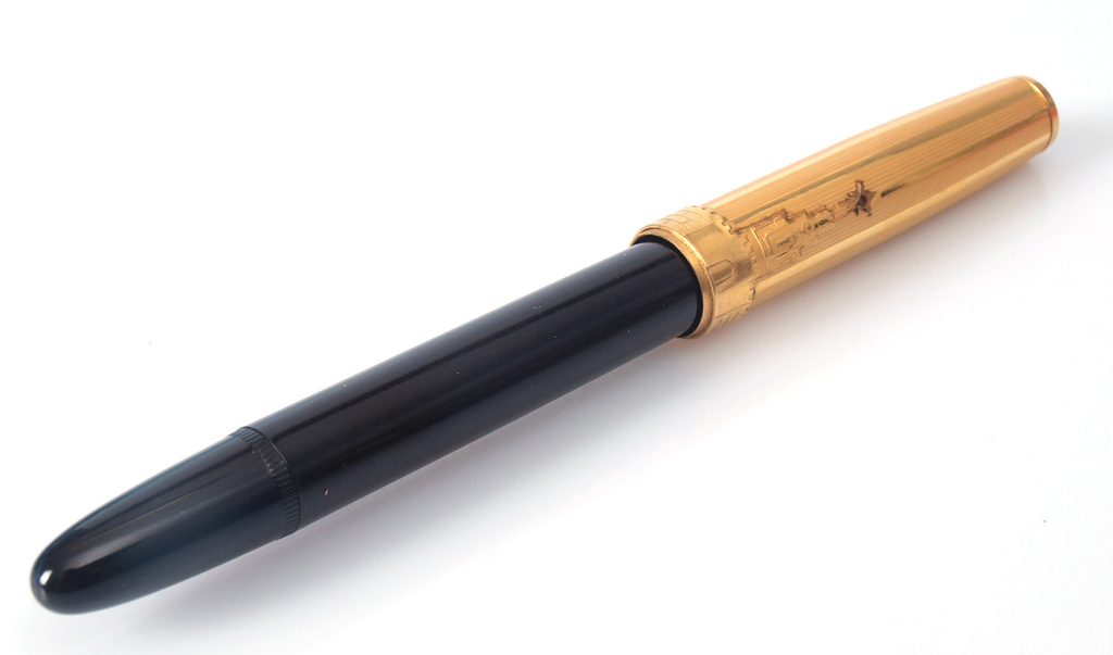 Pildspalva ar zelta uzgali