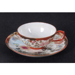 Porcelain cup with saucer