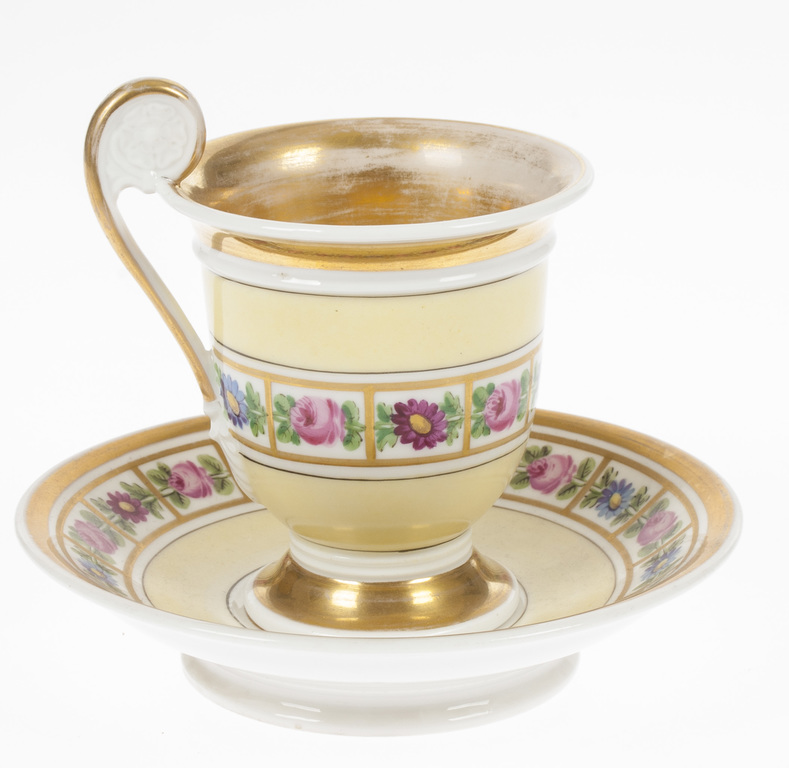 Porcelain cup with saucer