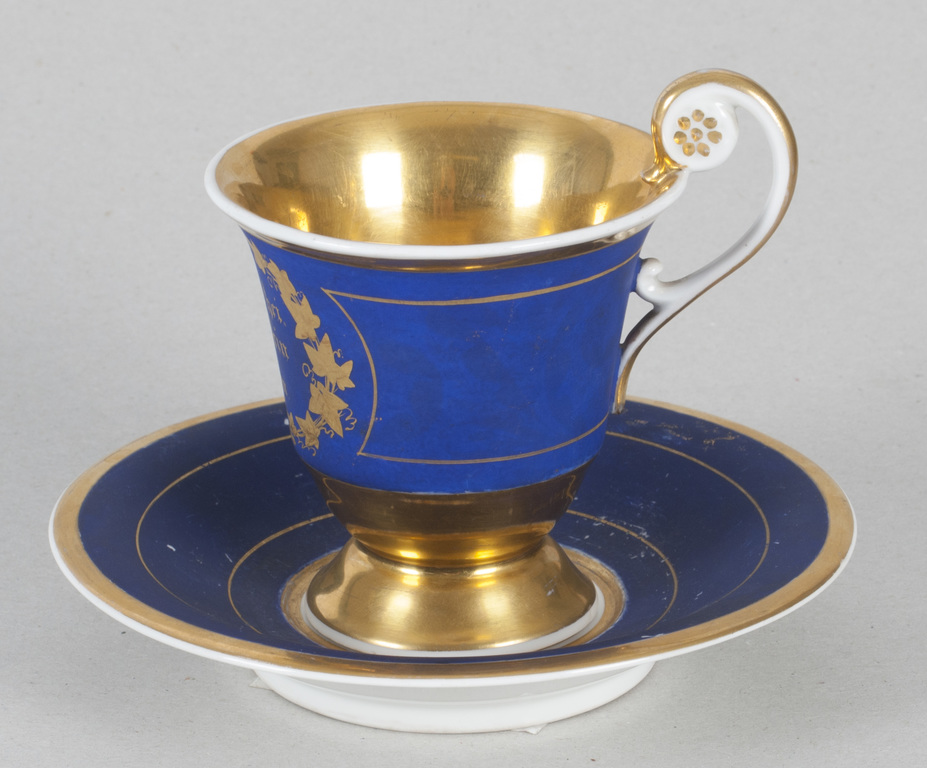 Porcelain cup with saucer