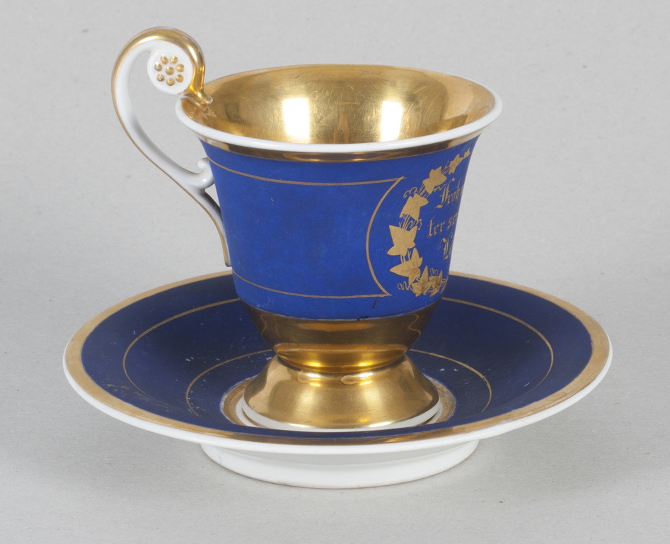 Porcelain cup with saucer