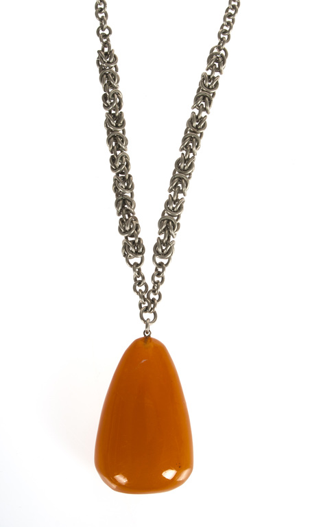 Metal necklace with molten amber pendant