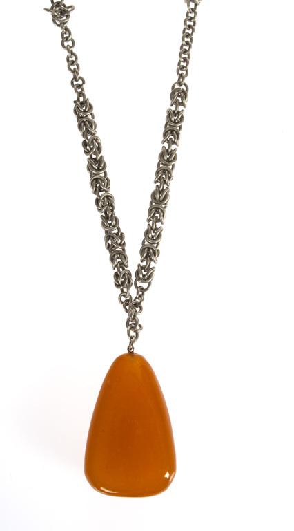 Metal necklace with molten amber pendant