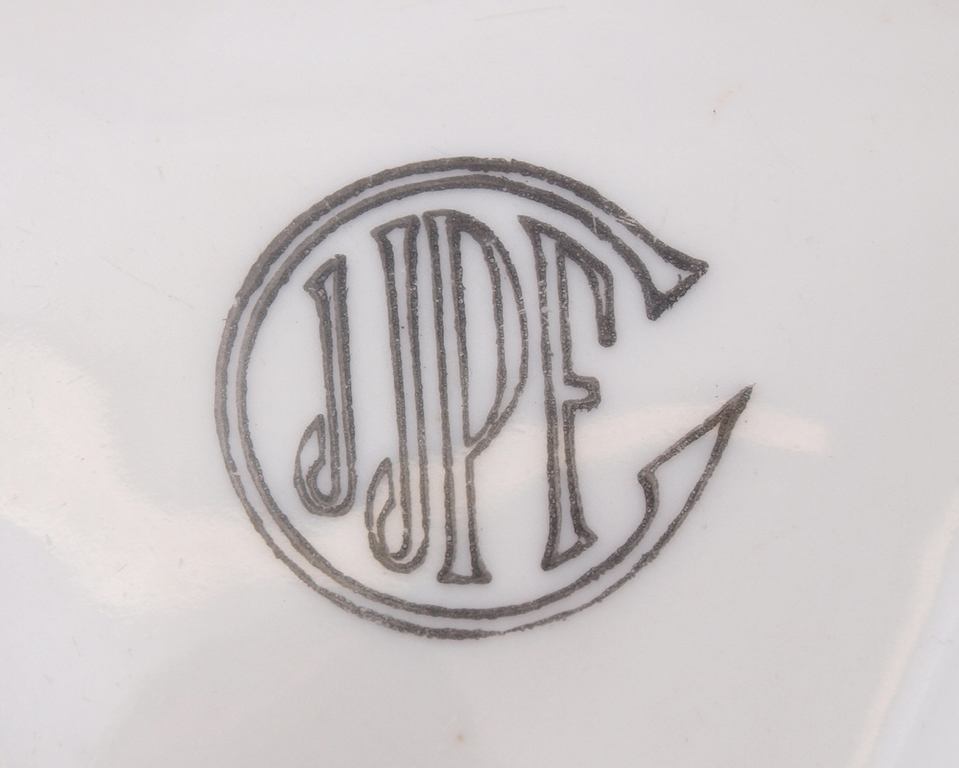 Porcelain ashtray with advertising “Porcelain fabric in Riga, in Milgravis, J.C. Jessen”