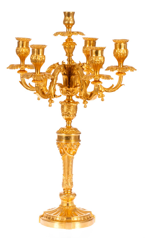 Gilded bronze clock with candlesticks