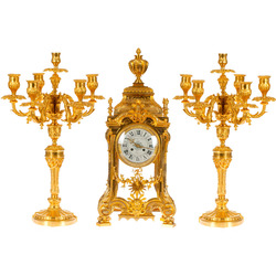 Zeltītas bronzas pulkstenis ar svečturiem