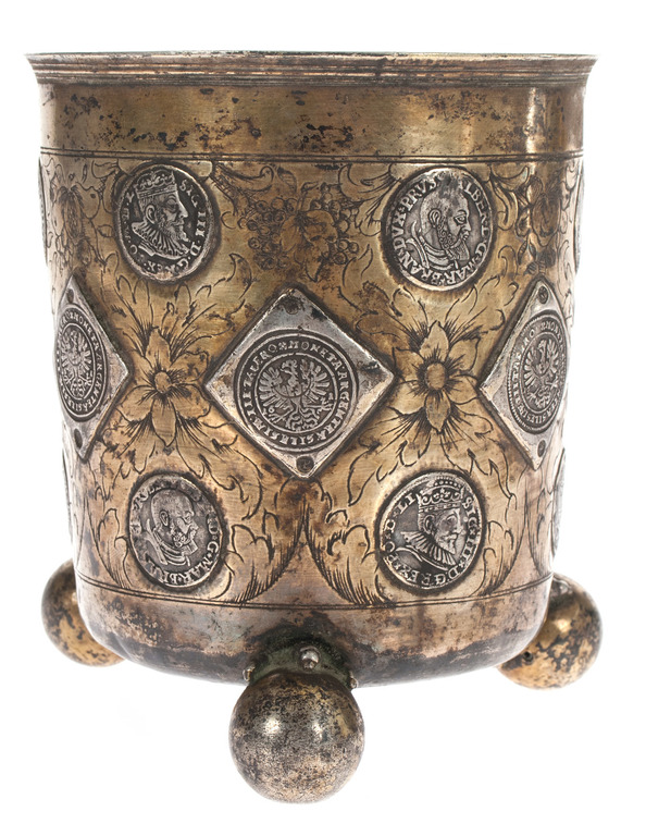 Silver cup with coins