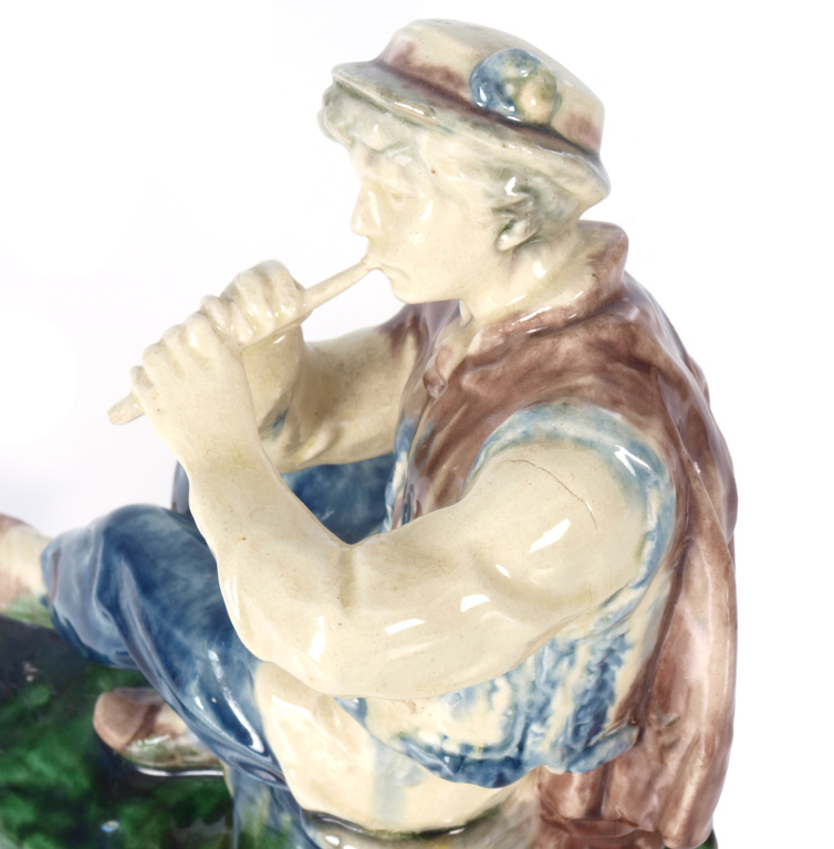 Faience figure „Piper”