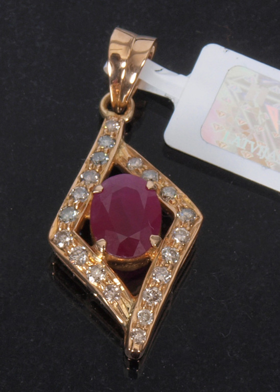 Gold ring and pendant with diamonds and rubies
