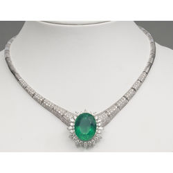 Gold necklace with diamonds and emeralds