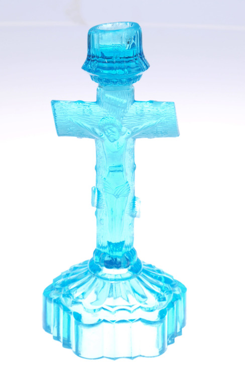 Colorful glass candlestick with a religious theme