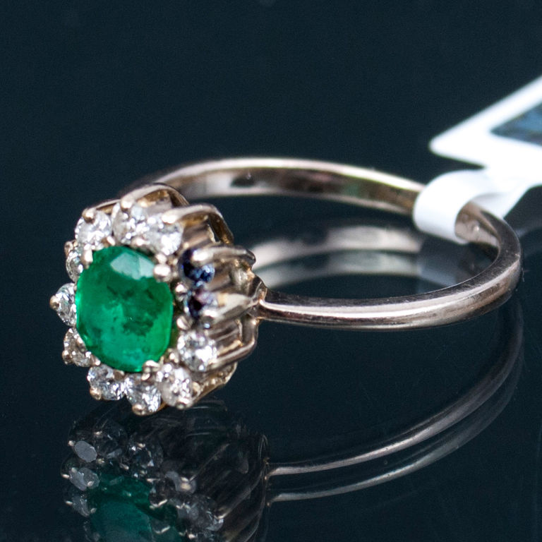 Gold ring with emeralds and diamonds
