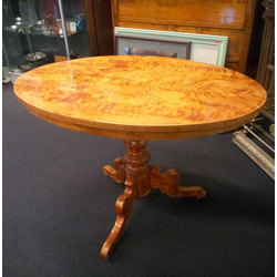 Tea table with a blazing birch veneer