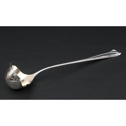 Gilded silver soup ladle
