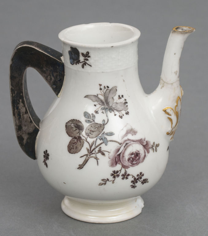 Porcelain teapot with silver handle