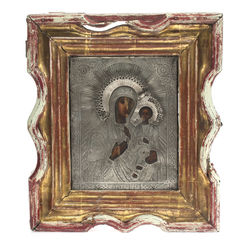 Silver icon in the wooden frame