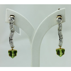 Gold earrings with brilliants, peridots