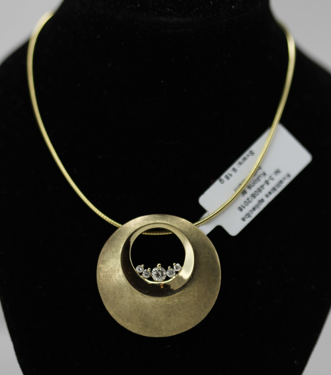 Golden necklace with a golden pendant