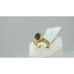 Gold ring with emerald