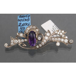 Golden brooch with diamonds and amethyst