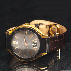 Piaget gold watch with leather strap