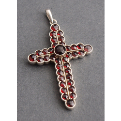 Silver cross with garnets