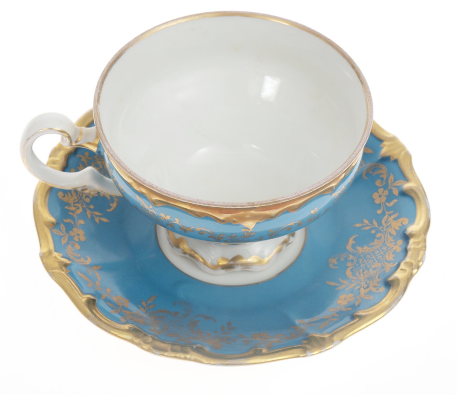 Porcelain cup with saucer