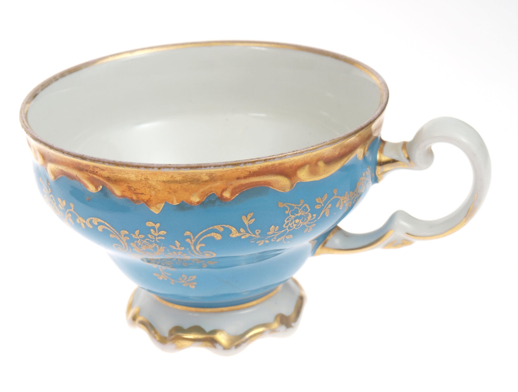 Porcelain cup with saucer