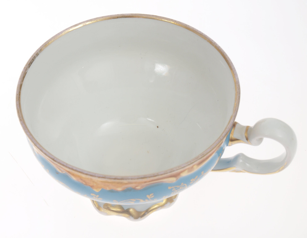 Porcelain cup with saucer