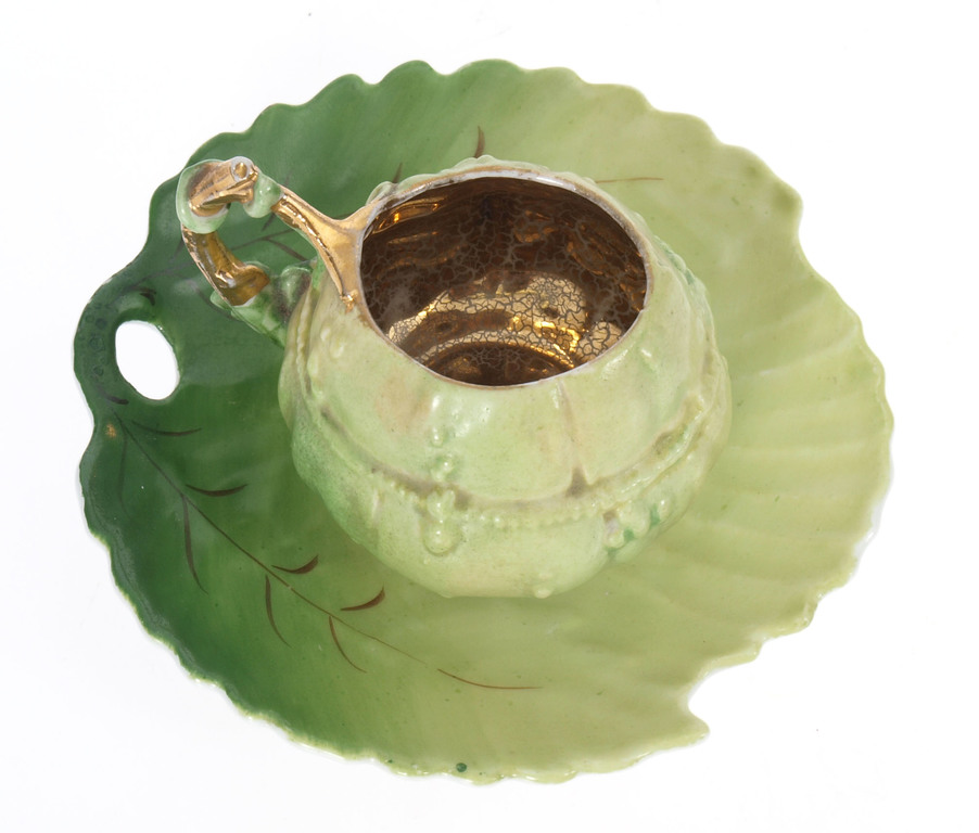 Porcelain cup with saucer