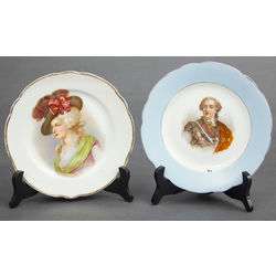 Two porcelain wall plates