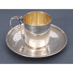 Silver cup with saucer 