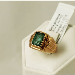 Gold ring with emerald