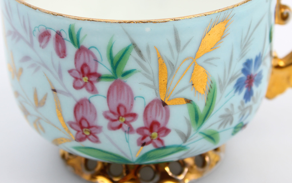 Porcelain cup with saucer