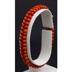 Gold bracelet with coral