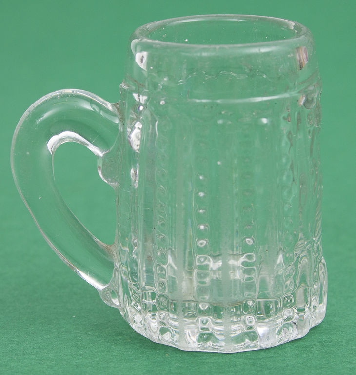 A small glass cup with Jewish symbolism