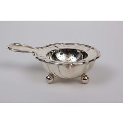 Baroque silver tea strainer and tray