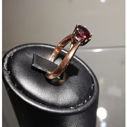 Golden ring with garnet