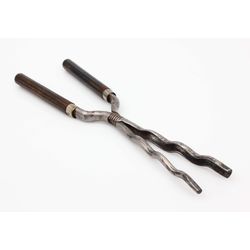 Metal curling tongs