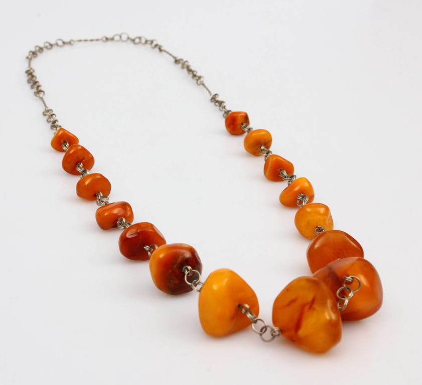 Amber necklace with metal finish