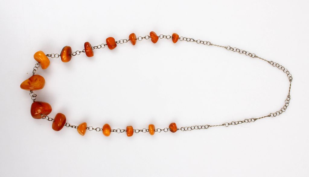 Amber necklace with metal finish