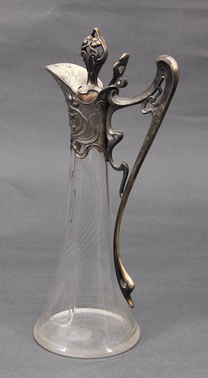 Glass decanter with silver-plated metal finish