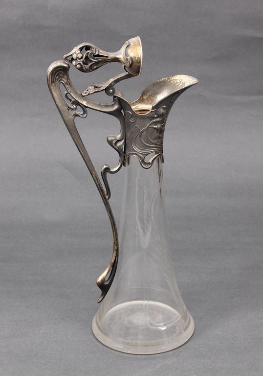 Glass decanter with silver-plated metal finish