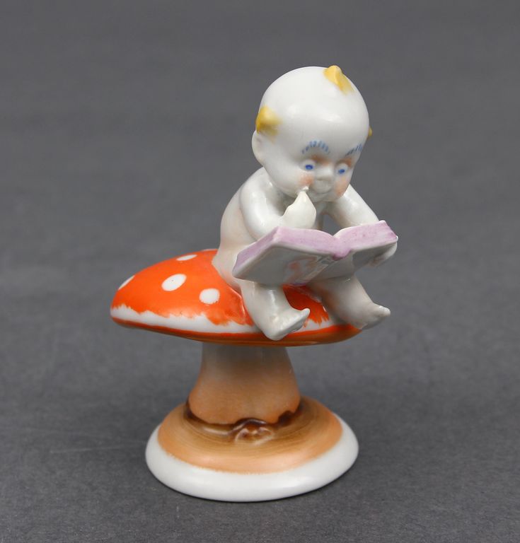 Porcelain figurine Boy on the mushroom